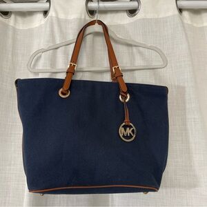 Michael Kors Navy and Tan jet, setter canvas, and leather Tote Bag